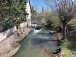 Pêcheur au bord du Valençon
