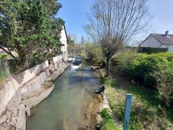 Pêcheur au bord du Valençon